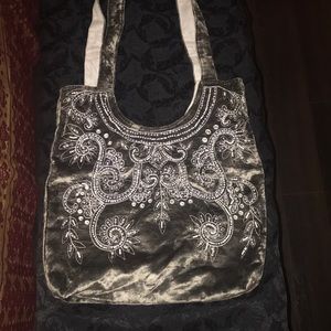 Silver embellished hobo bag
